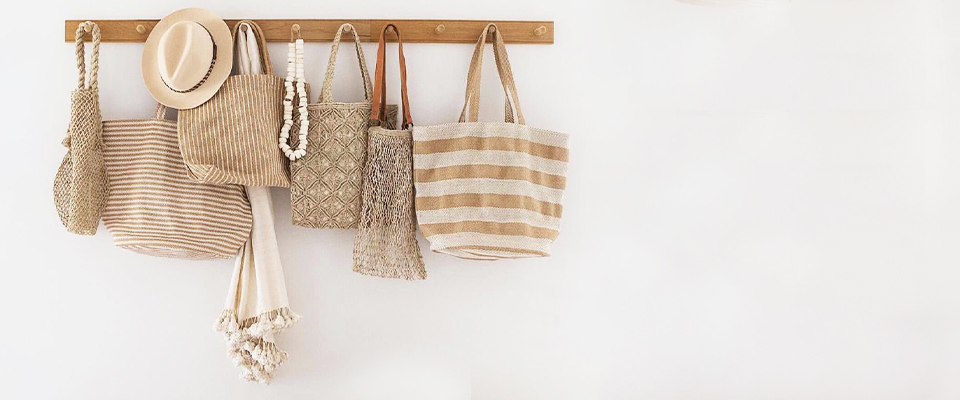 Natural jute bag with handles for eco-friendly shopping and daily use.