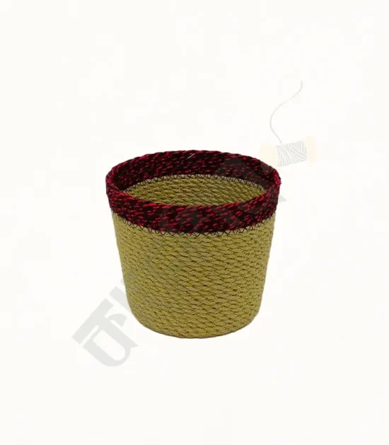 Natural jute planter for indoor and outdoor plants, featuring a simple and eco-friendly design.