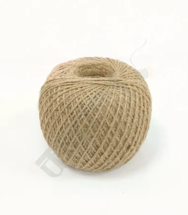 Natural jute rope coiled for crafting and heavy-duty use.