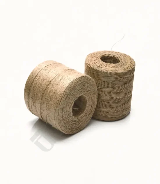 Natural jute yarn wound in a ball for knitting and crafting.