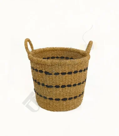 Handwoven seagrass planter basket with a natural design, perfect for indoor plants.