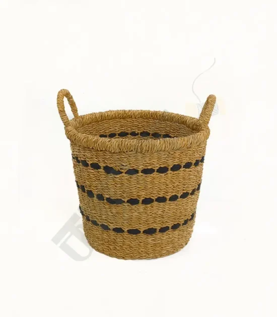 Handwoven seagrass planter basket with a natural design, perfect for indoor plants.